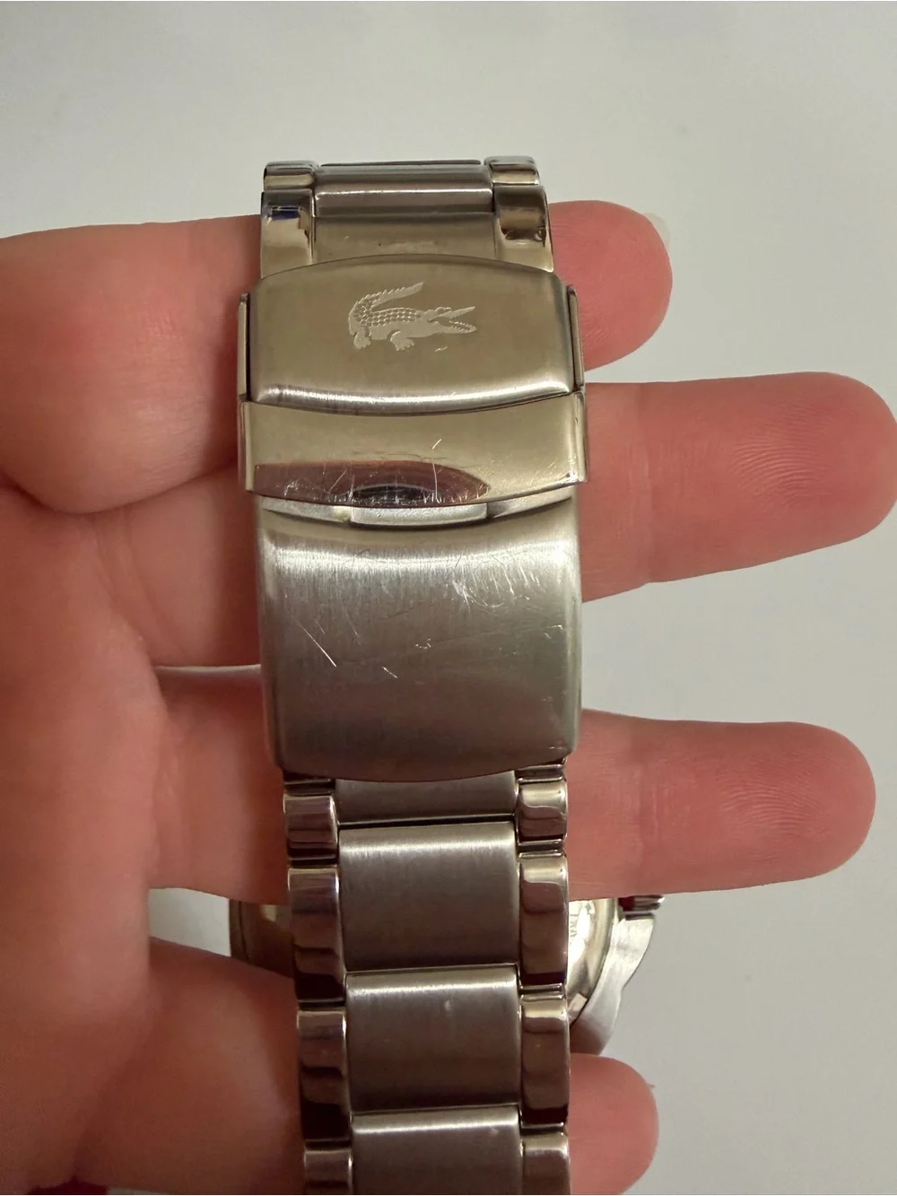 Lacoste Silver Stainless Steel Watch with Black Dial and Red Accents